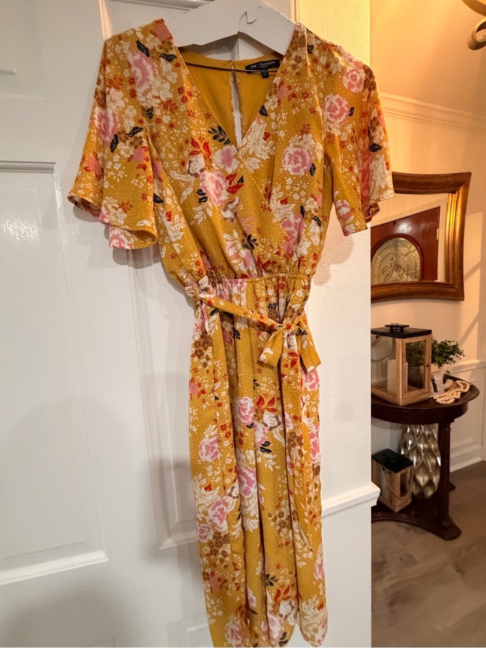 Flutter-Sleeve Floral Wrap Jumpsuit in Mustard Yellow